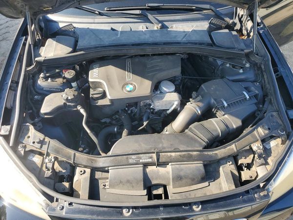 2013 BMW X1 sDrive28i — Engine bay