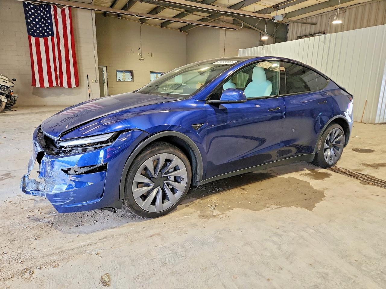 2026 TESLA MODEL Y — Front 3/4
