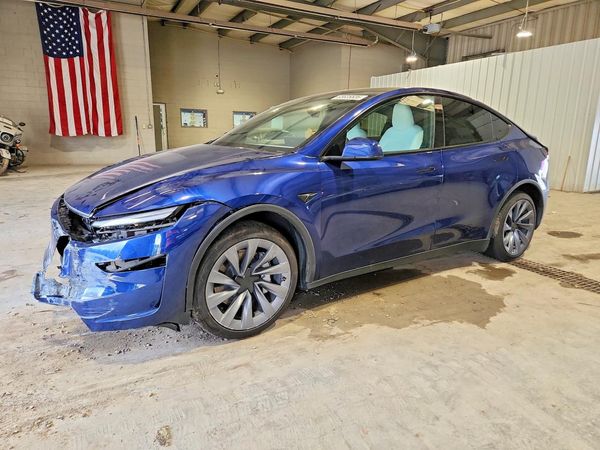 2026 TESLA MODEL Y — Front 3/4