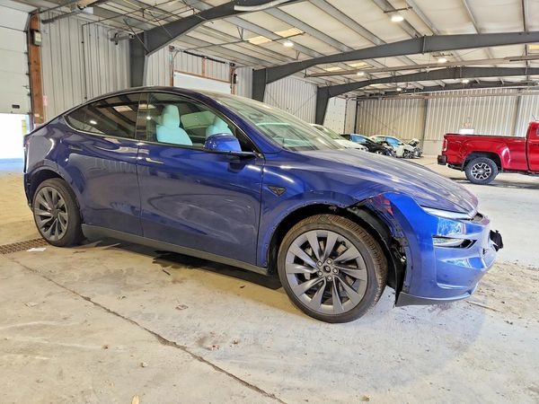 2026 TESLA MODEL Y — Passenger 3/4