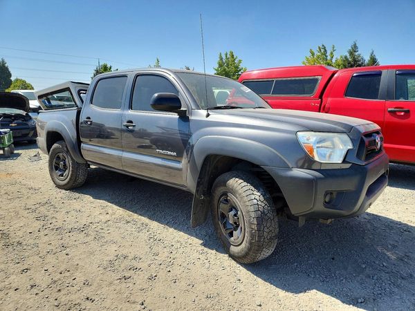 2014 TOYOTA TACOMA Delux Grade — Passenger 3/4