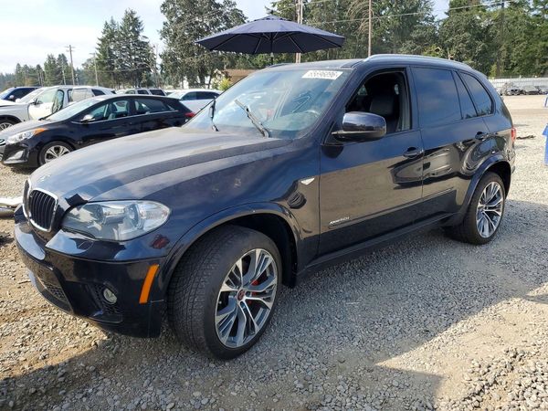 2012 BMW X5 xDrive50i — Front 3/4