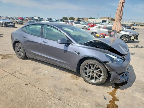 2023 TESLA MODEL 3 — Passenger 3/4