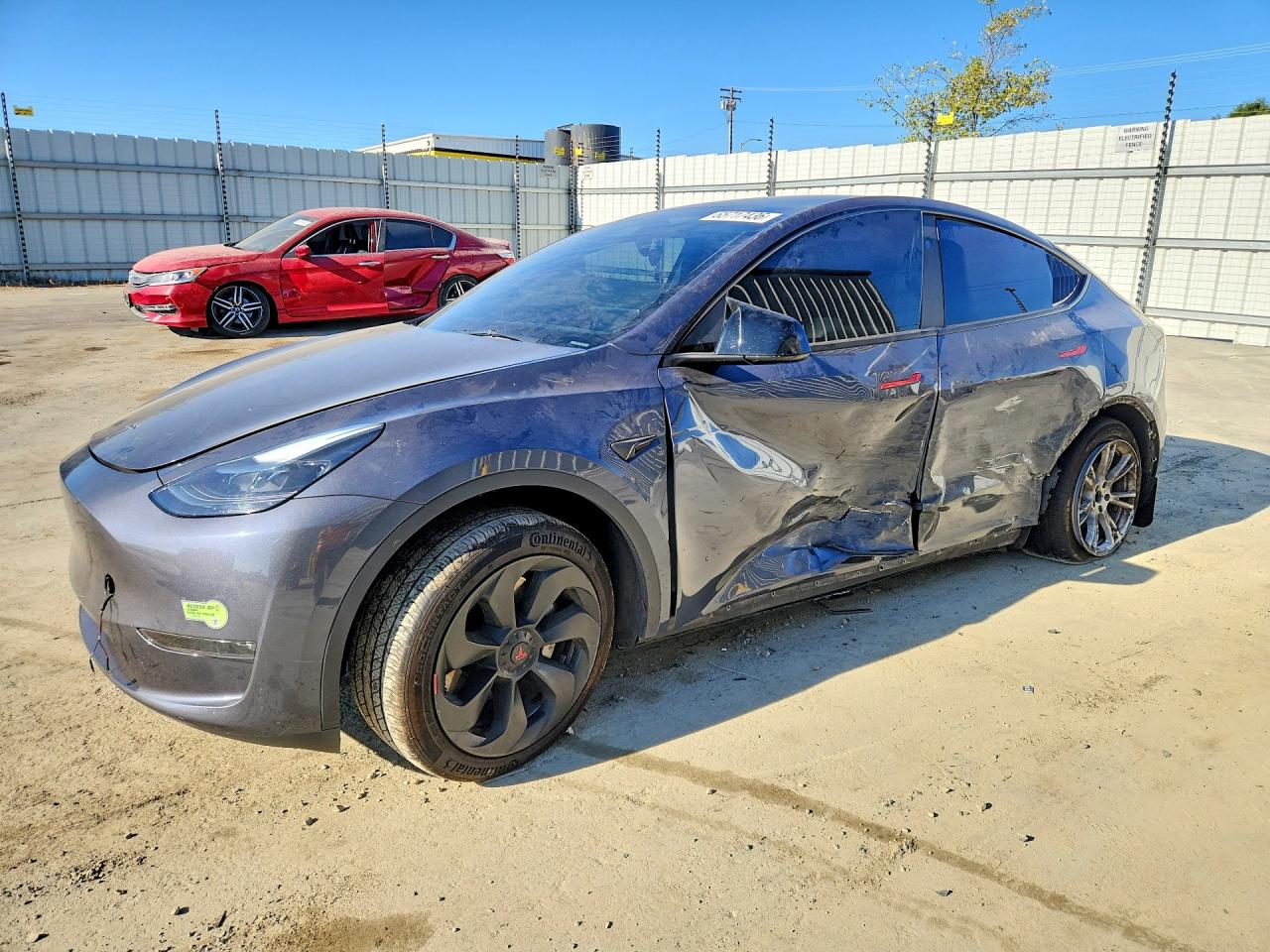 2023 TESLA MODEL Y — Front 3/4