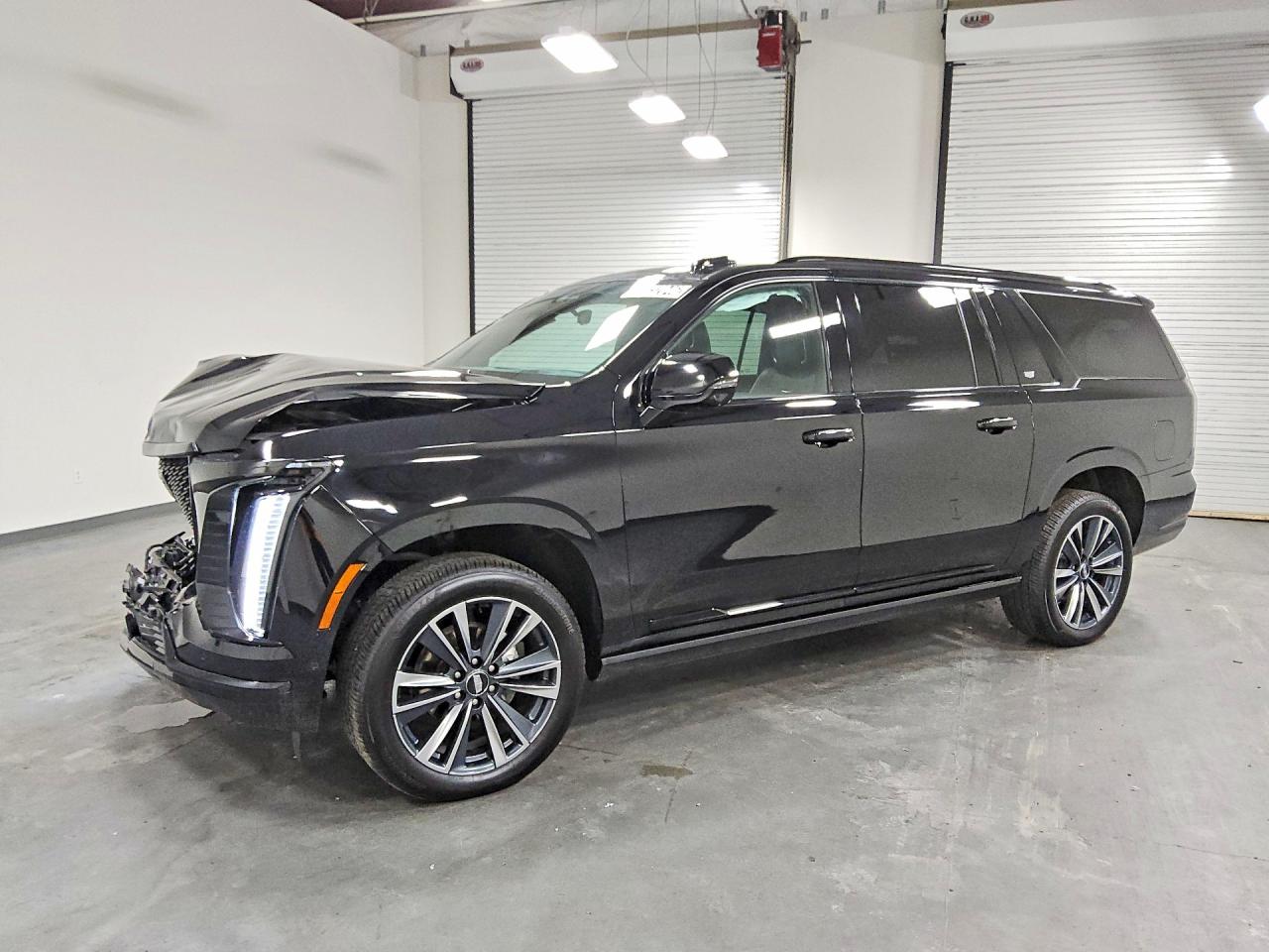 2025 CADILLAC ESCALADE Sport — Front 3/4