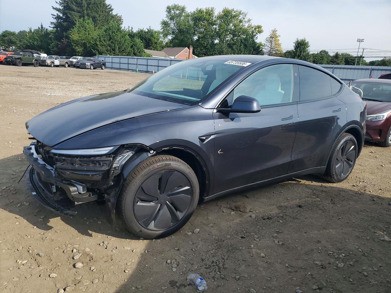 2026 TESLA MODEL Y — Front 3/4