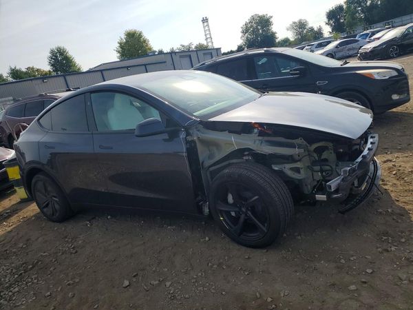 2026 TESLA MODEL Y — Passenger 3/4