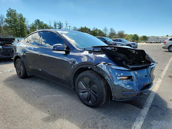 2026 TESLA MODEL Y — Passenger 3/4