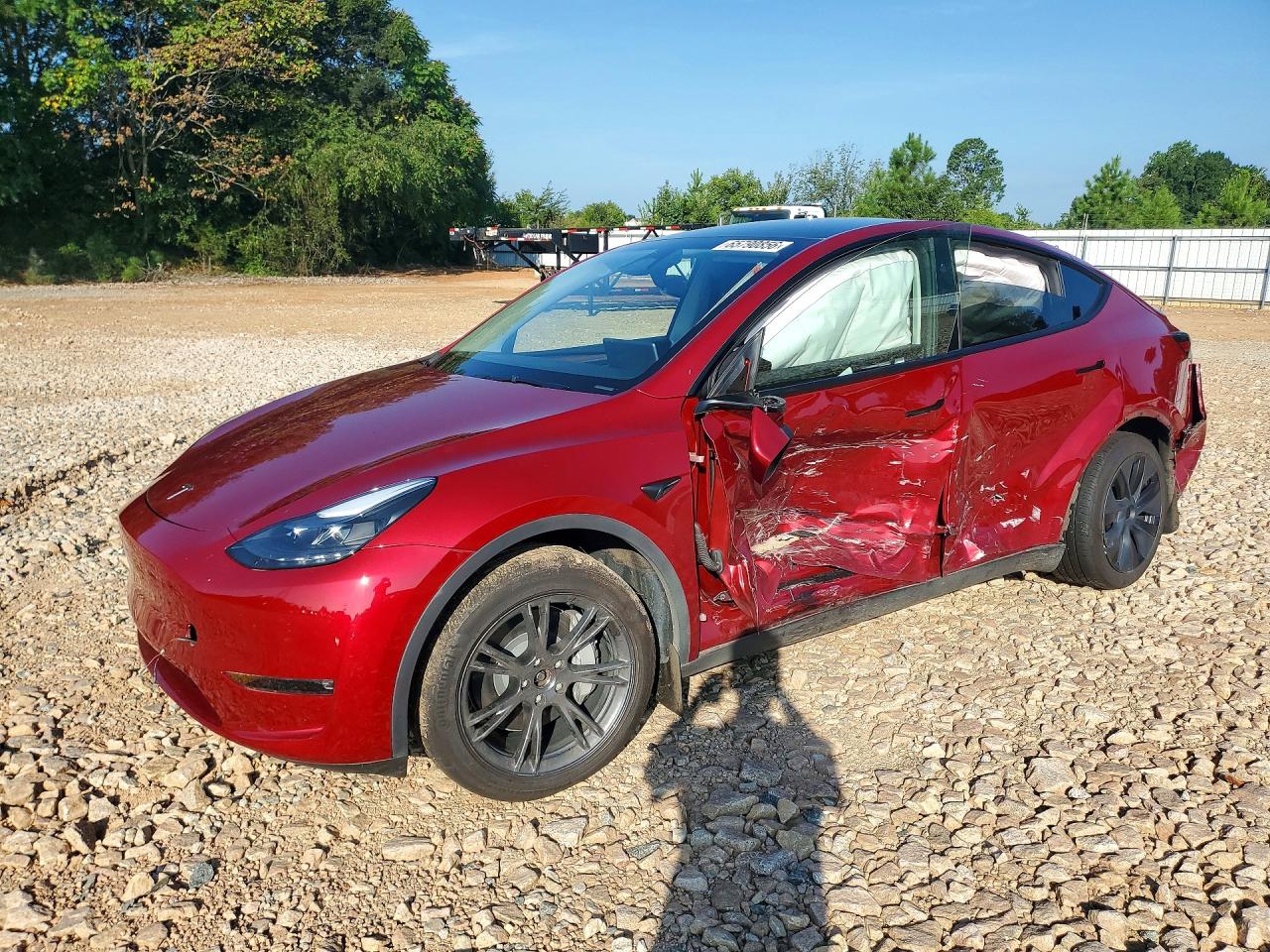 2025 TESLA MODEL Y — Front 3/4