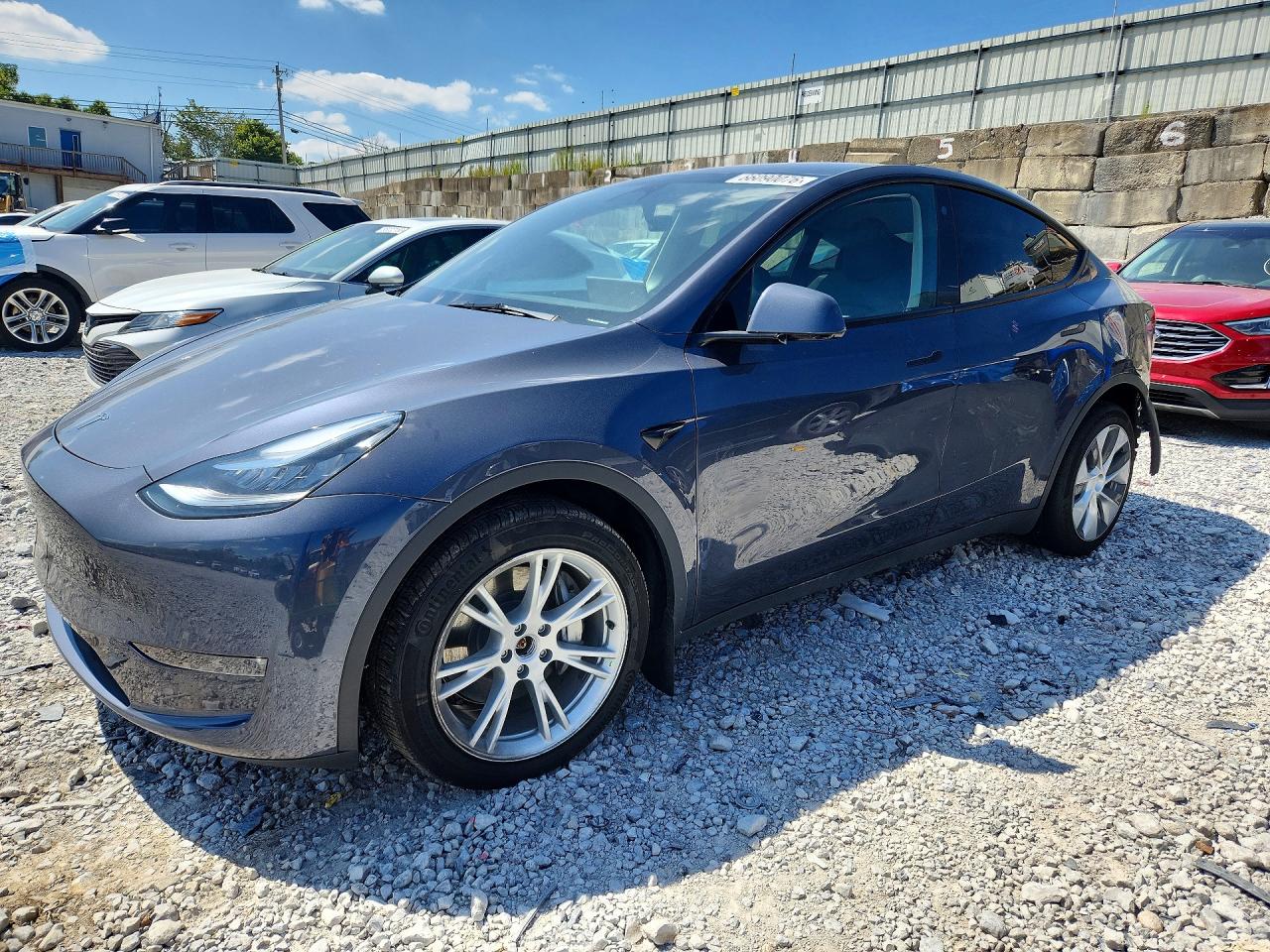 2023 TESLA MODEL Y — Front 3/4