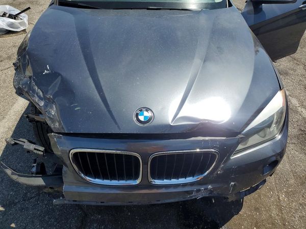 2013 BMW X1 xDrive28i — Engine bay