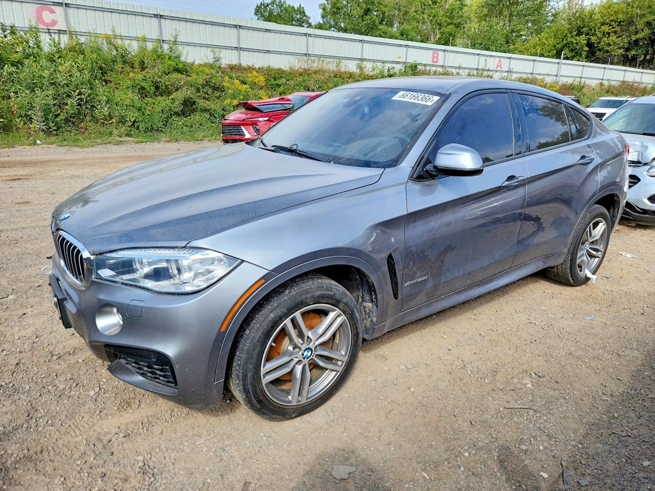 2017 BMW X6 xDrive50i — Front 3/4