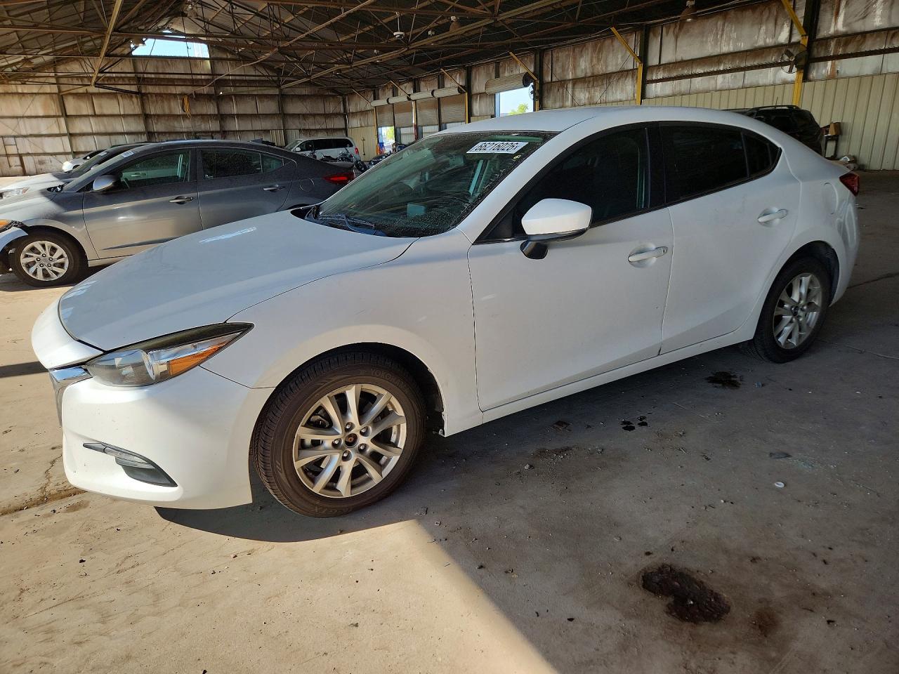 2017 MAZDA 3 — Front 3/4