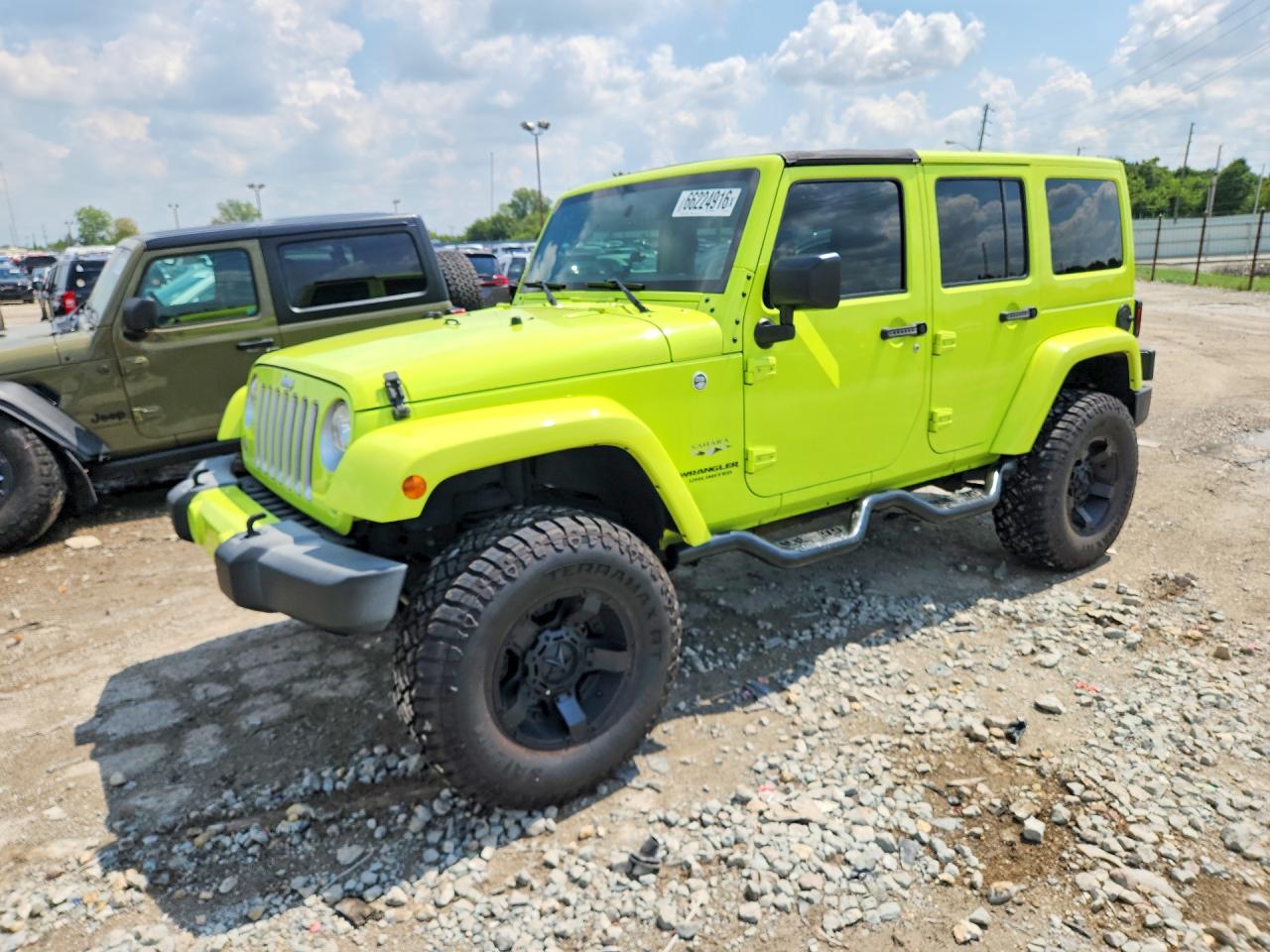 2017 JEEP WRANGLER UNLIMITED SAHARA 4X4 — Front 3/4