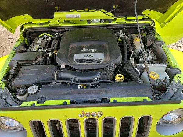 2017 JEEP WRANGLER UNLIMITED SAHARA 4X4 — Engine bay