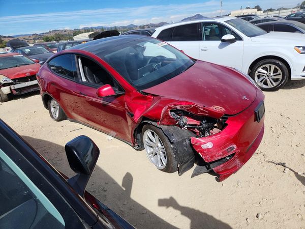 2024 TESLA MODEL Y — Passenger 3/4