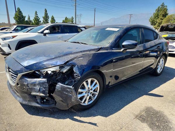 2015 MAZDA 3 Touring/GS — Front 3/4