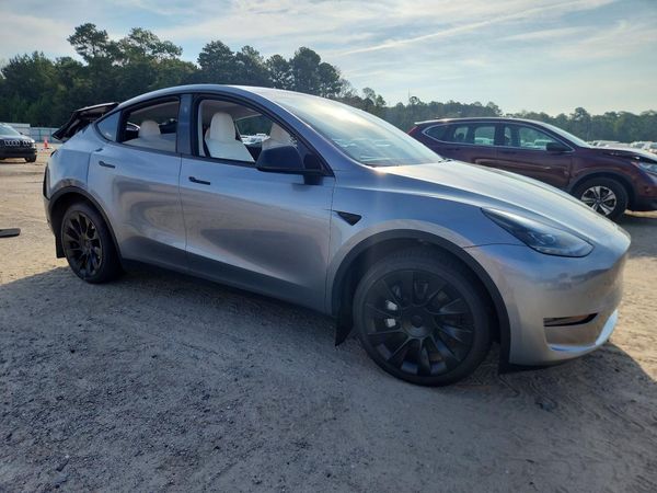 2024 TESLA MODEL Y — Passenger 3/4