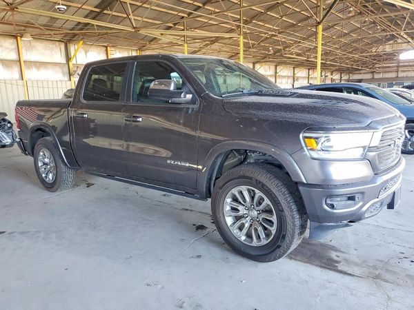 2019 RAM 1500 Laramie — Passenger 3/4