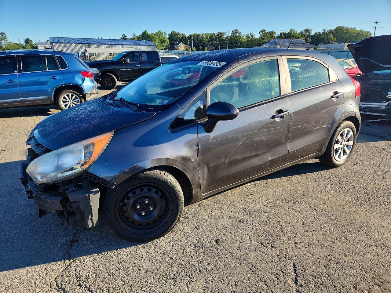 2013 KIA RIO 5-DOOR EX / SX — Front 3/4