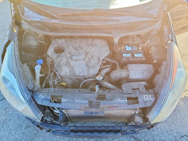 2013 KIA RIO 5-DOOR EX / SX — Engine bay