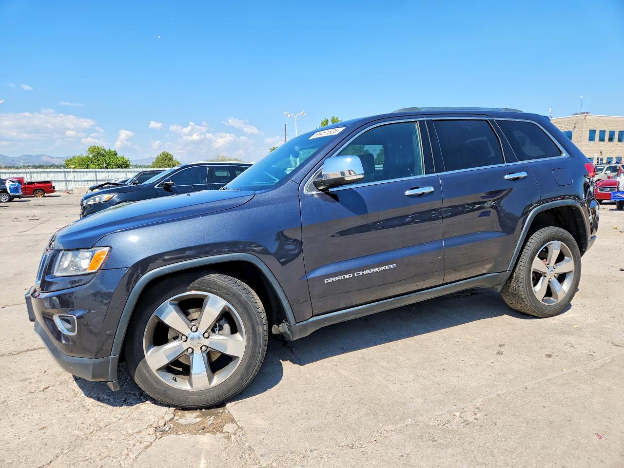 2015 JEEP GRAND CHEROKEE Limited — Front 3/4