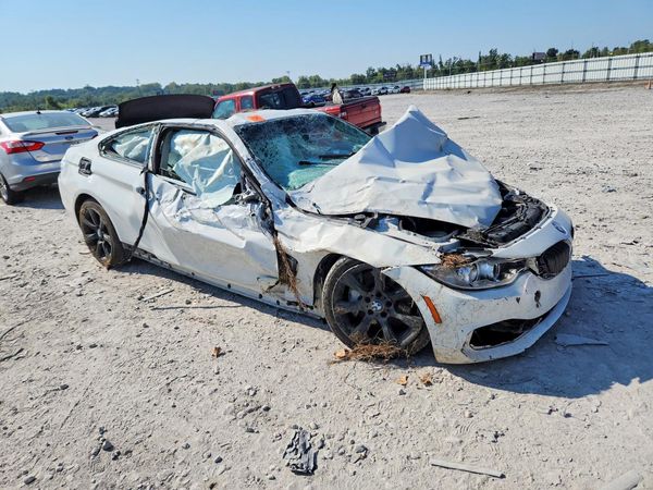 2015 BMW 4 SERIES xDrive — Passenger 3/4