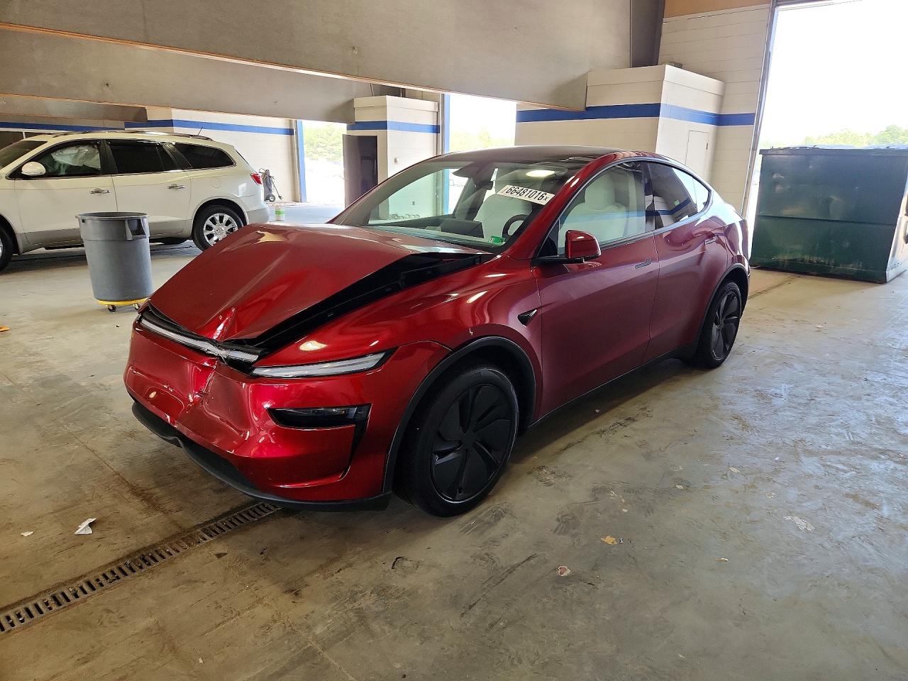 2026 TESLA MODEL Y — Front 3/4