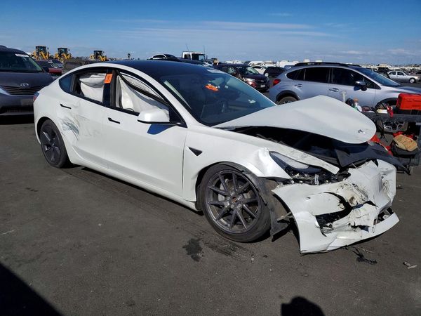 2023 TESLA MODEL 3 — Passenger 3/4