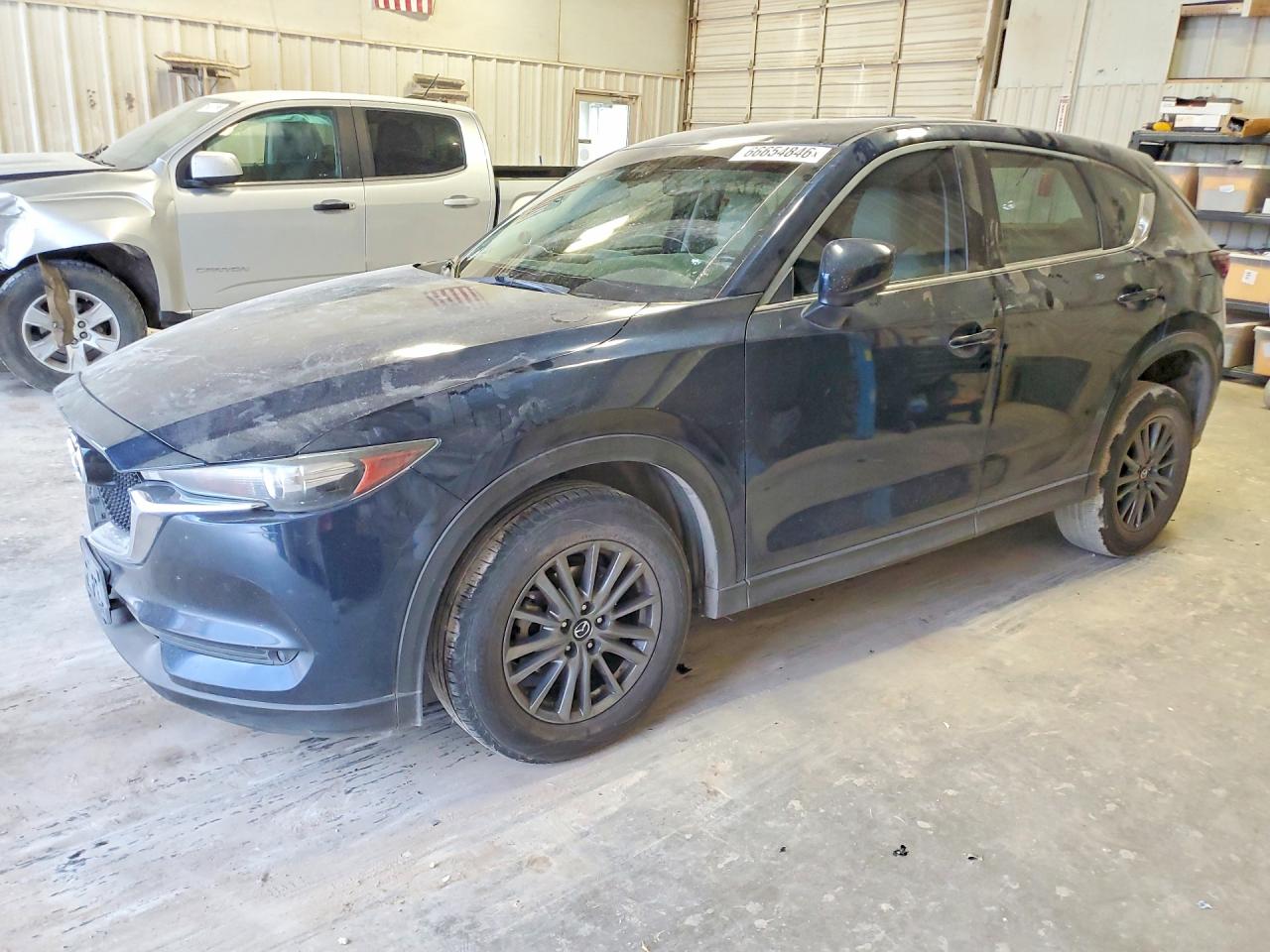 2017 MAZDA CX-5 Touring — Front 3/4