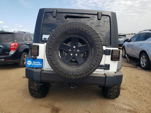 2016 JEEP WRANGLER Sport — DIRR