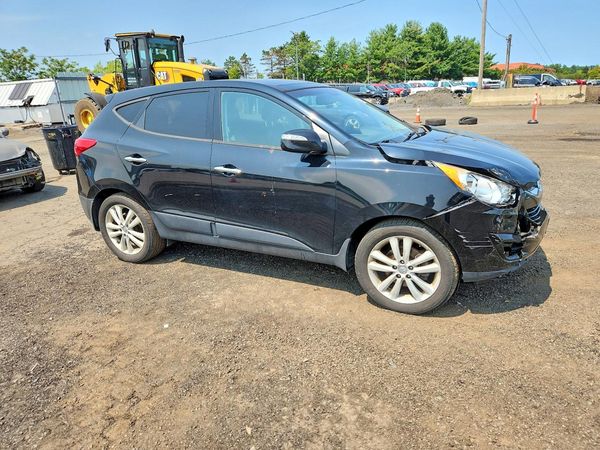 2013 HYUNDAI TUCSON — Passenger 3/4