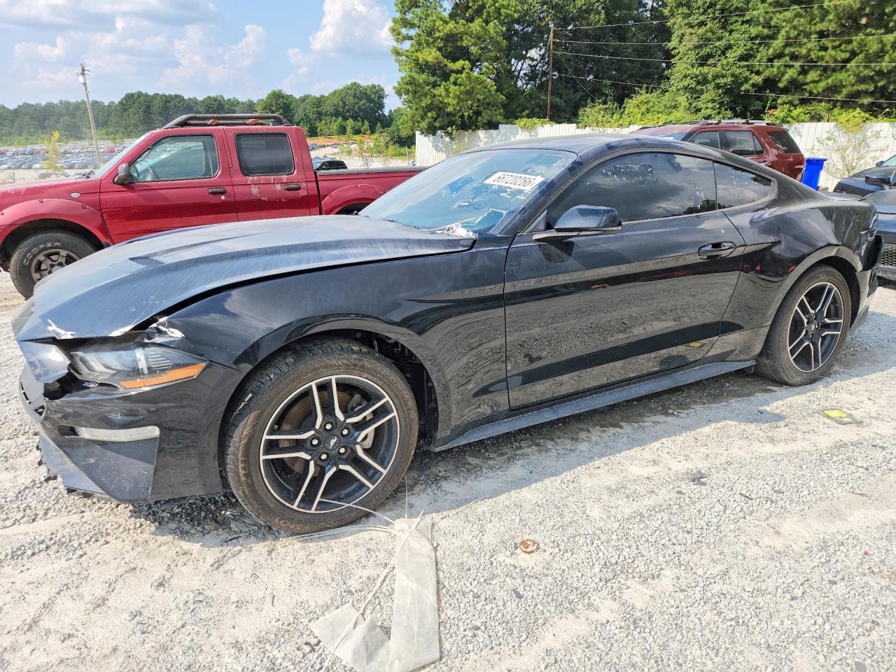 2019 FORD MUSTANG I4 Coupe — Front 3/4