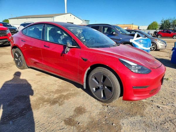 2023 TESLA MODEL 3 — Passenger 3/4