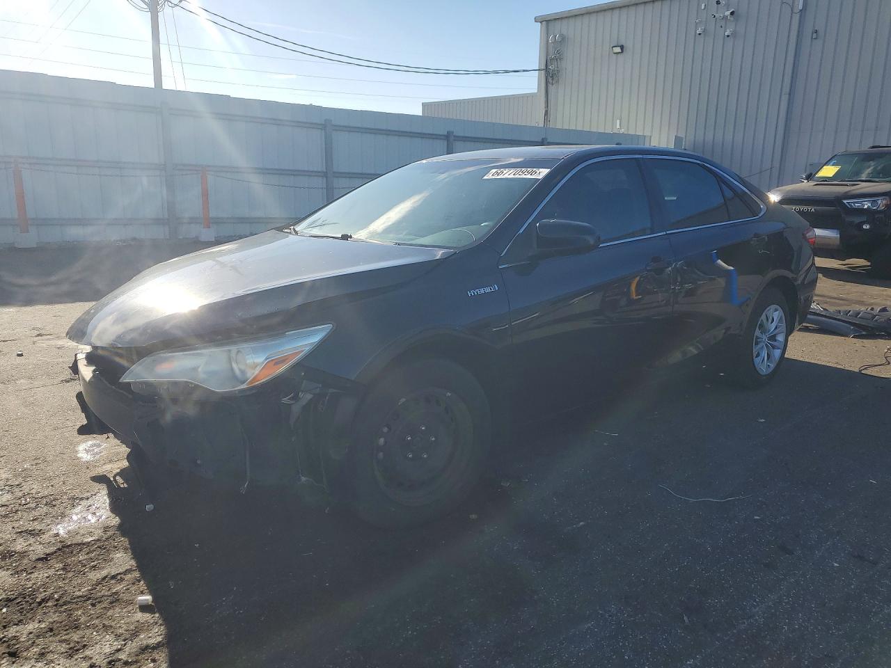 2016 TOYOTA CAMRY SOLA Hybrid — Front 3/4