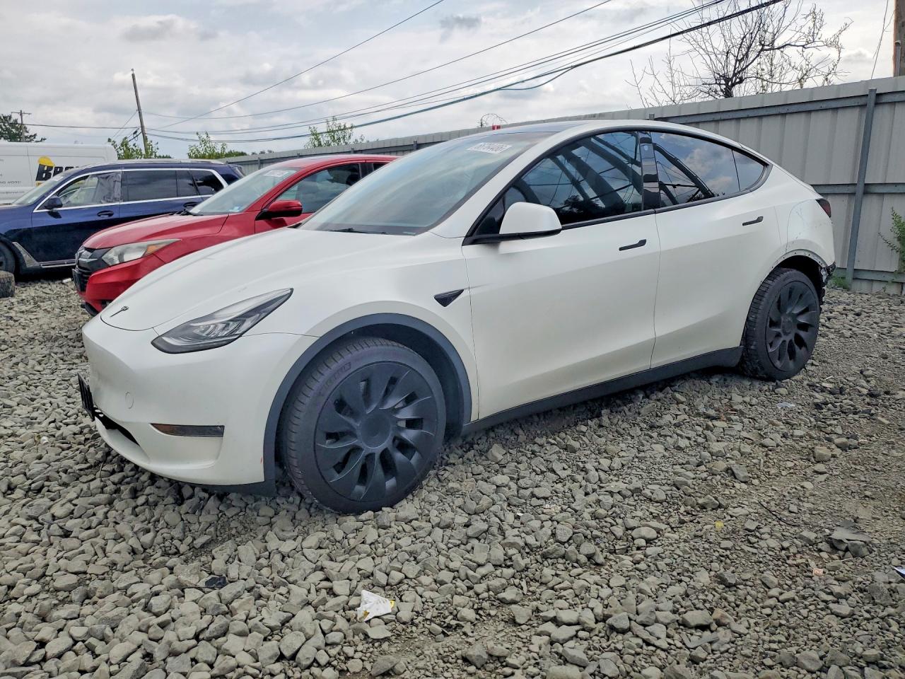 2023 TESLA MODEL Y — Front 3/4
