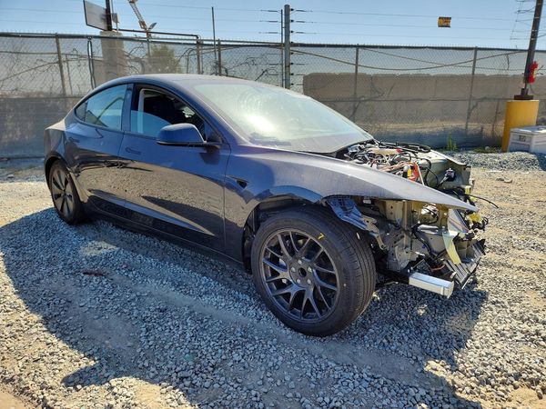 2024 TESLA MODEL 3 — Passenger 3/4