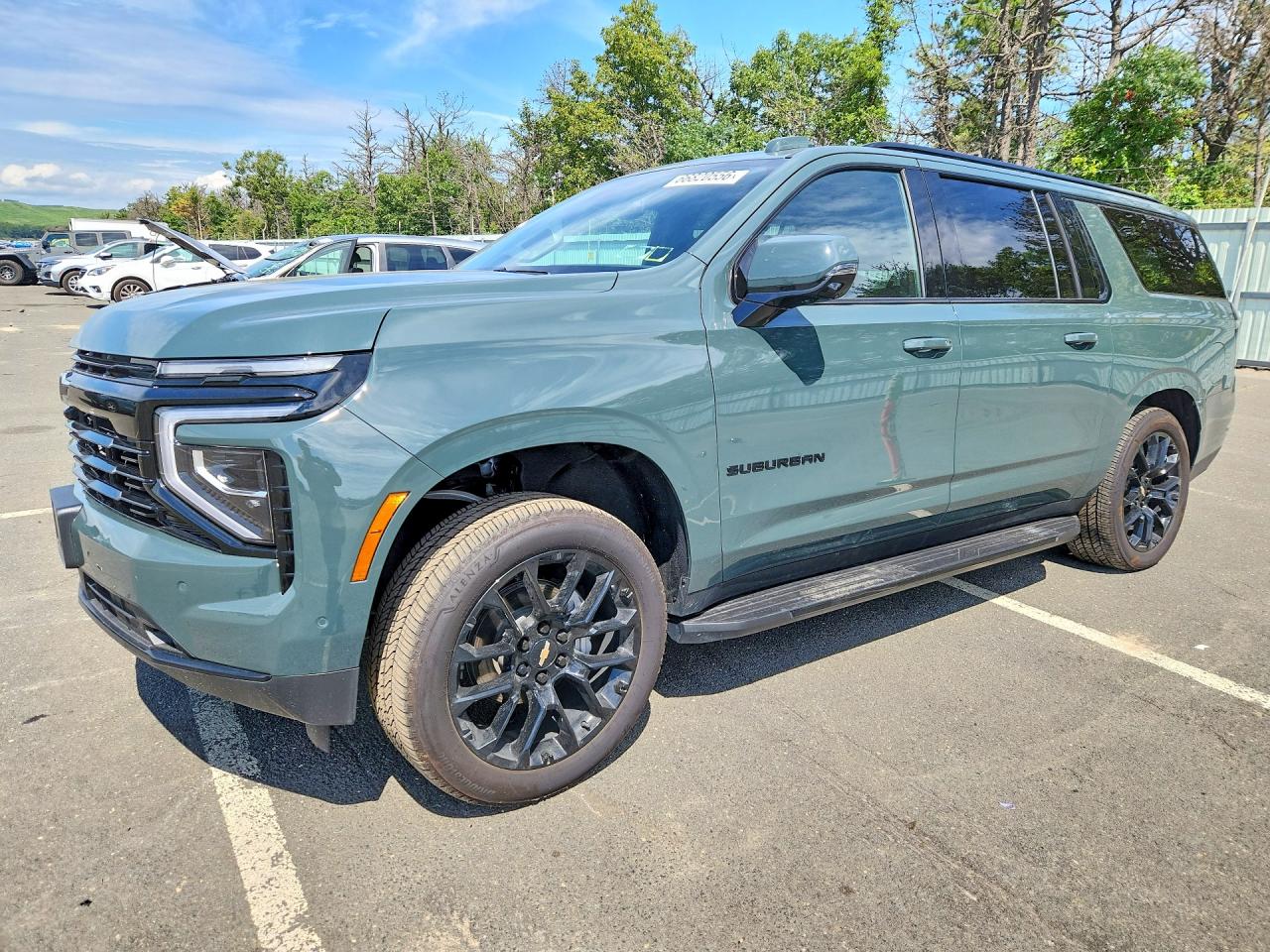 2026 CHEVROLET SUBURBAN RST — Front 3/4