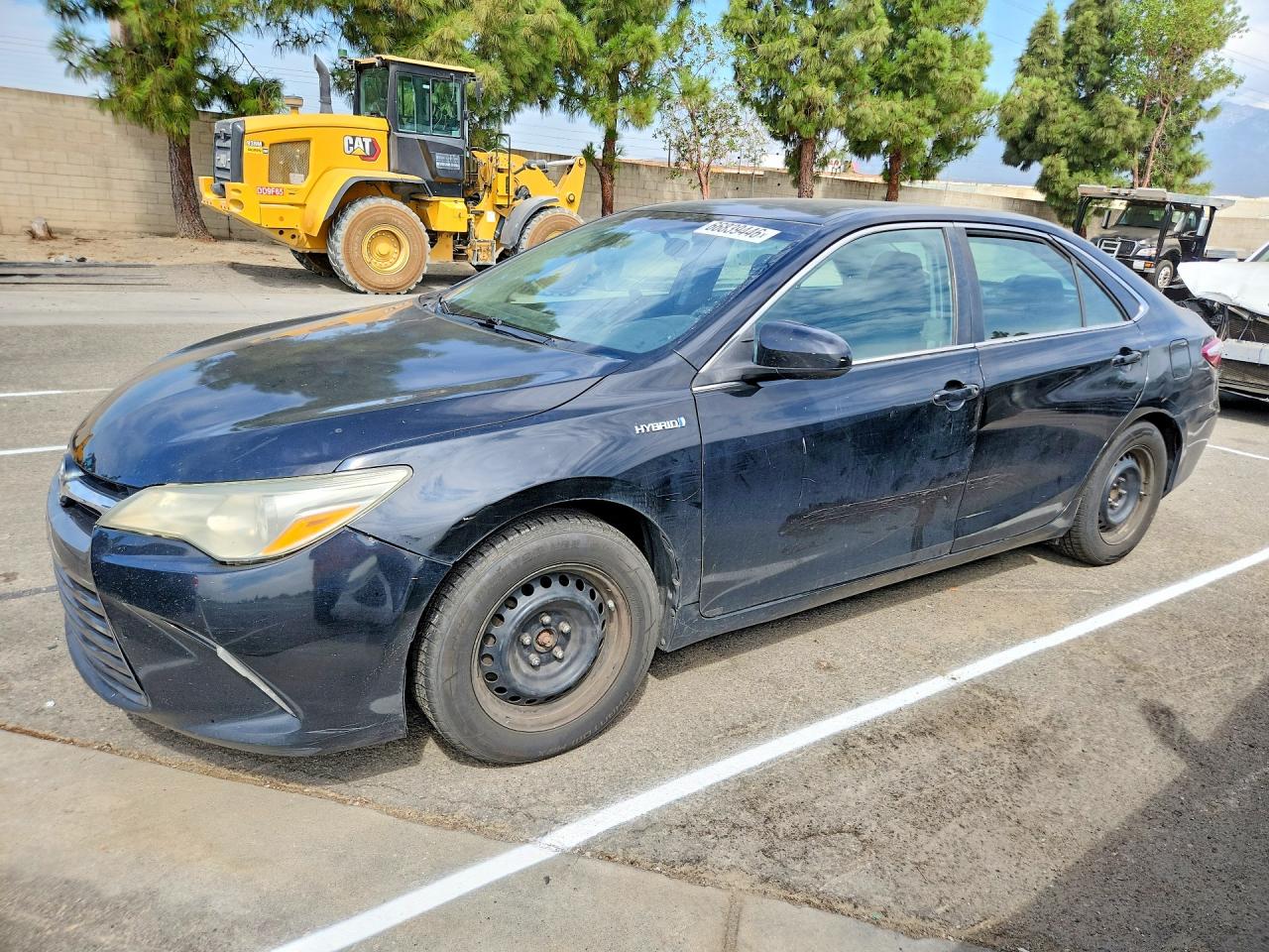 2015 TOYOTA CAMRY SOLA Hybrid — Front 3/4