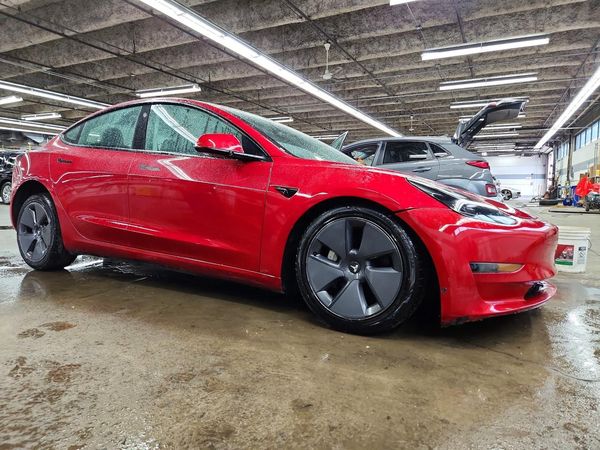 2023 TESLA MODEL 3 — Passenger 3/4