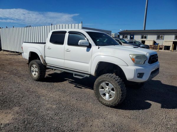 2014 TOYOTA TACOMA Delux Grade — Passenger 3/4