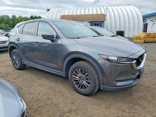 2021 MAZDA CX-5 Touring — Passenger 3/4
