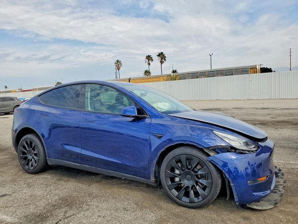 2021 TESLA MODEL Y — Passenger 3/4