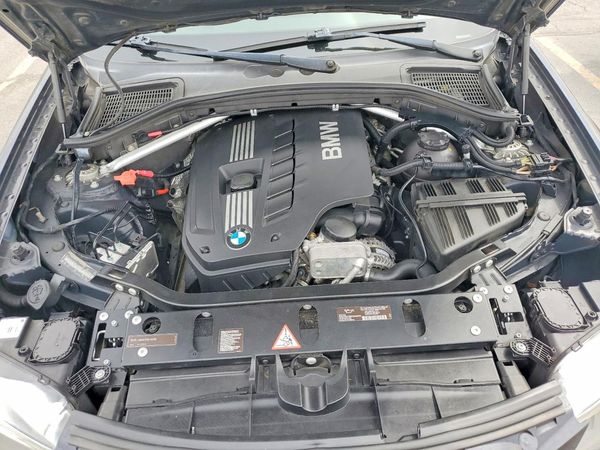 2012 BMW X3 xDrive28i — Engine bay