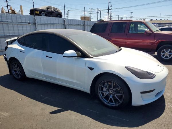 2023 TESLA MODEL 3 — Passenger 3/4