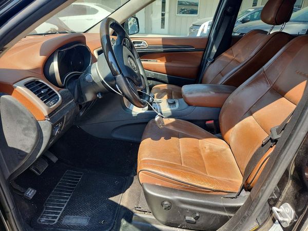 2015 JEEP GRAND CHEROKEE Summit — DENT