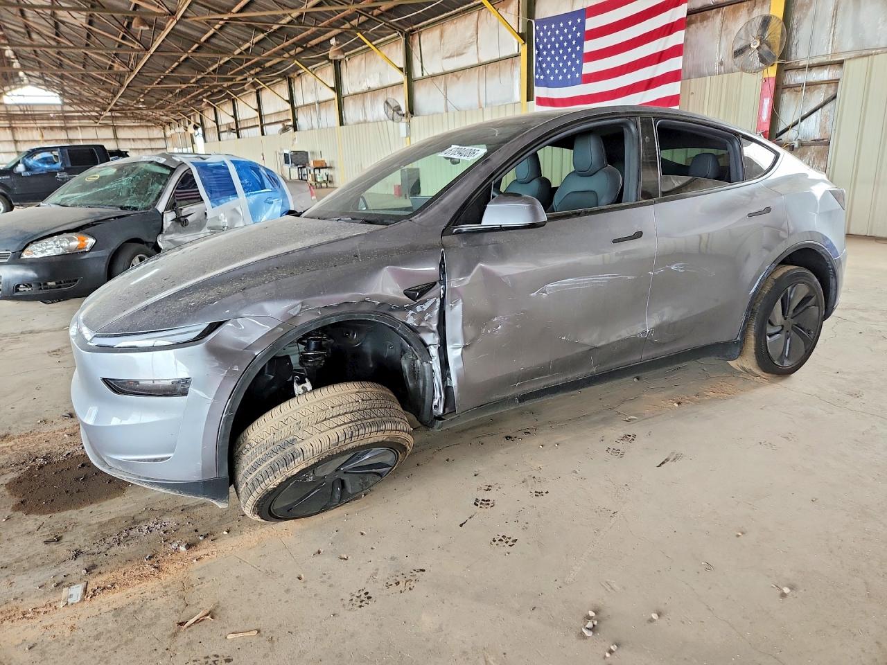 2026 TESLA MODEL Y — Front 3/4
