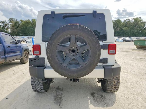 2015 JEEP WRANGLER UNLIMITED Sahara — DIRR