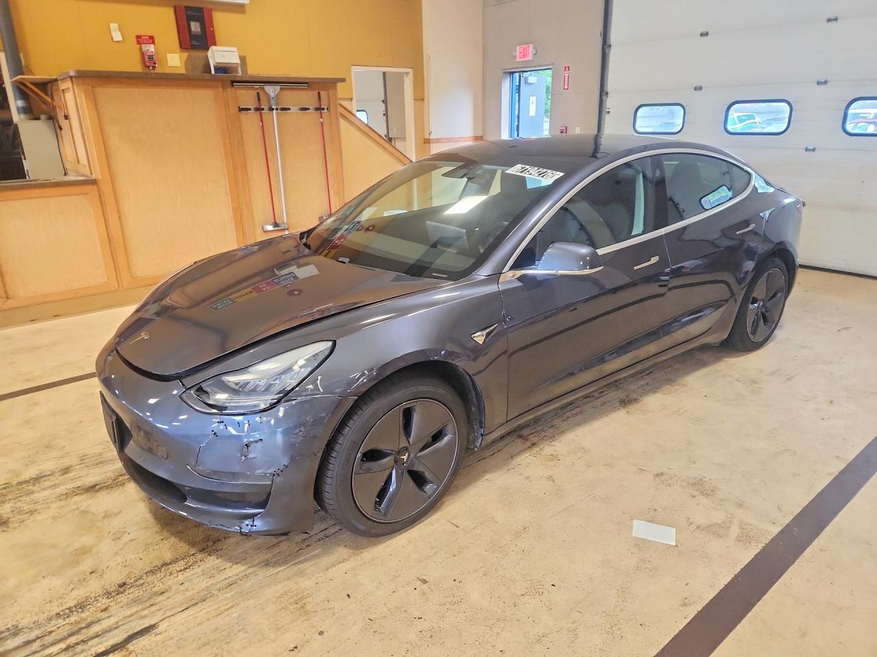2020 TESLA MODEL 3 — Front 3/4