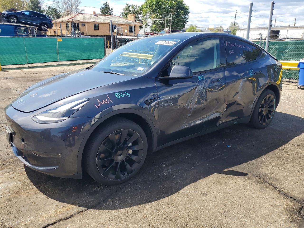 2024 TESLA MODEL Y — Front 3/4